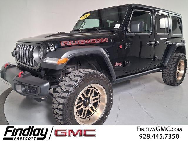 2025 Jeep Wrangler Rubicon in Black — front three-quarter view
