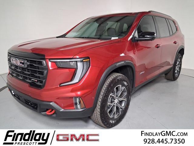 2026 GMC Acadia AT4 in Volcanic Red Tintcoat — front three-quarter view